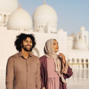 Couple outside Sheikh Zayed Grand Mosque