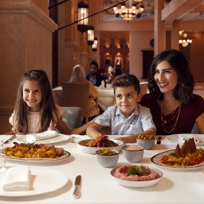 Family eating in abu dhabi