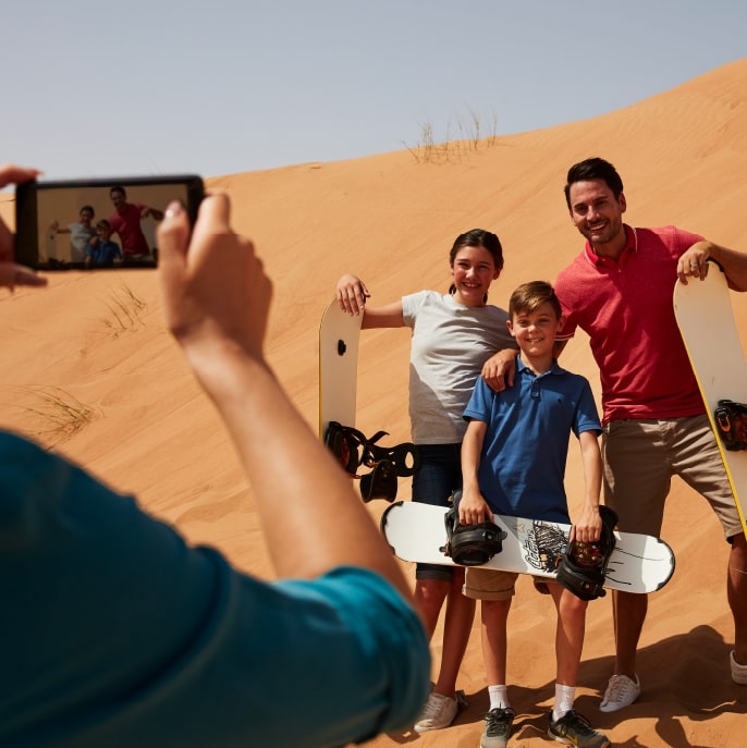 Sandboarding in the Dubai desert